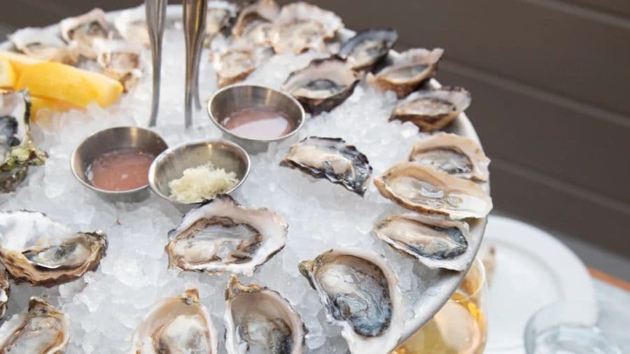 Seattle oyster bar ends strike with lower service charge, full tip access
