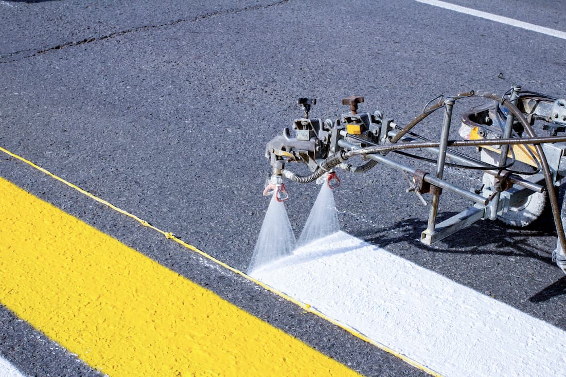 Sunapee road line striping crews working across town Tuesday