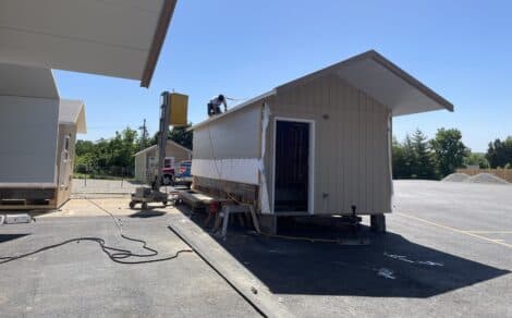 Peaslee Tech students build affordable homes from garage doors