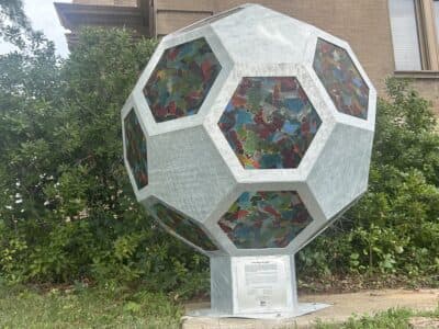 Downtown Lawrence unveils handmade World Cup soccer ball sculpture