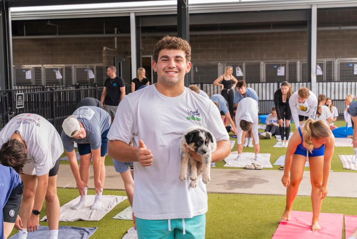 Baylor SAE Fraternity Leads Puppy Yoga Class at Waco Pet Shelter