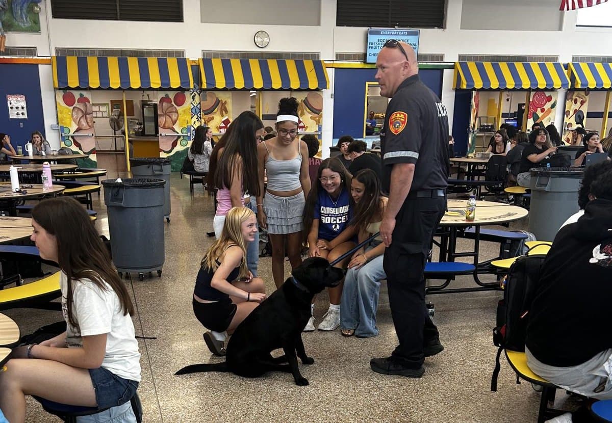 Suffolk County police therapy dog visits Comsewogue High School
