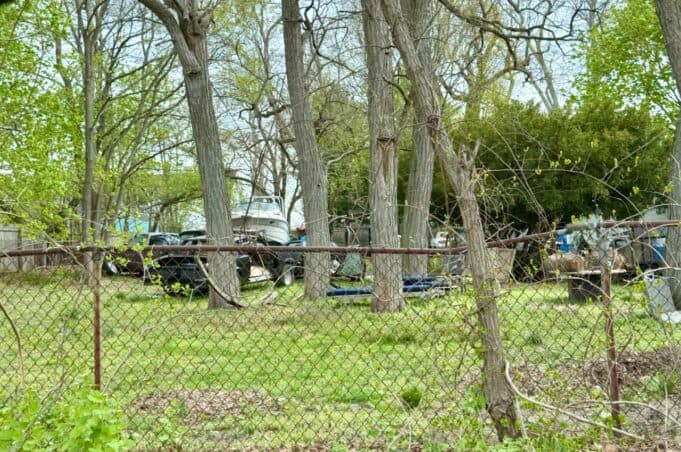 Riverhead search warrants uncover illegal housing, blight at two properties