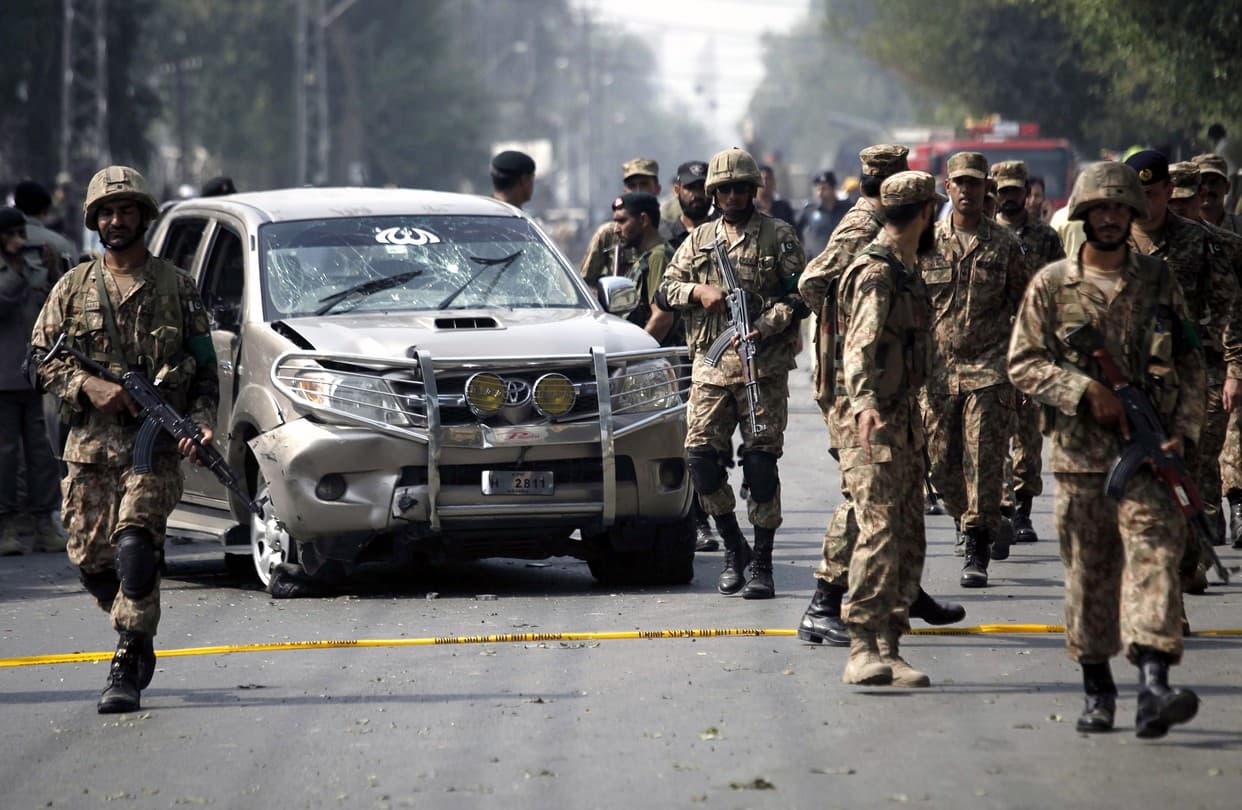 Suicide Bombers and Gunmen Strike Paramilitary Headquarters in Peshawar