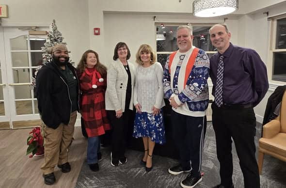 Rotary Club Brings Holiday Music and Care to Assisted Living Residents