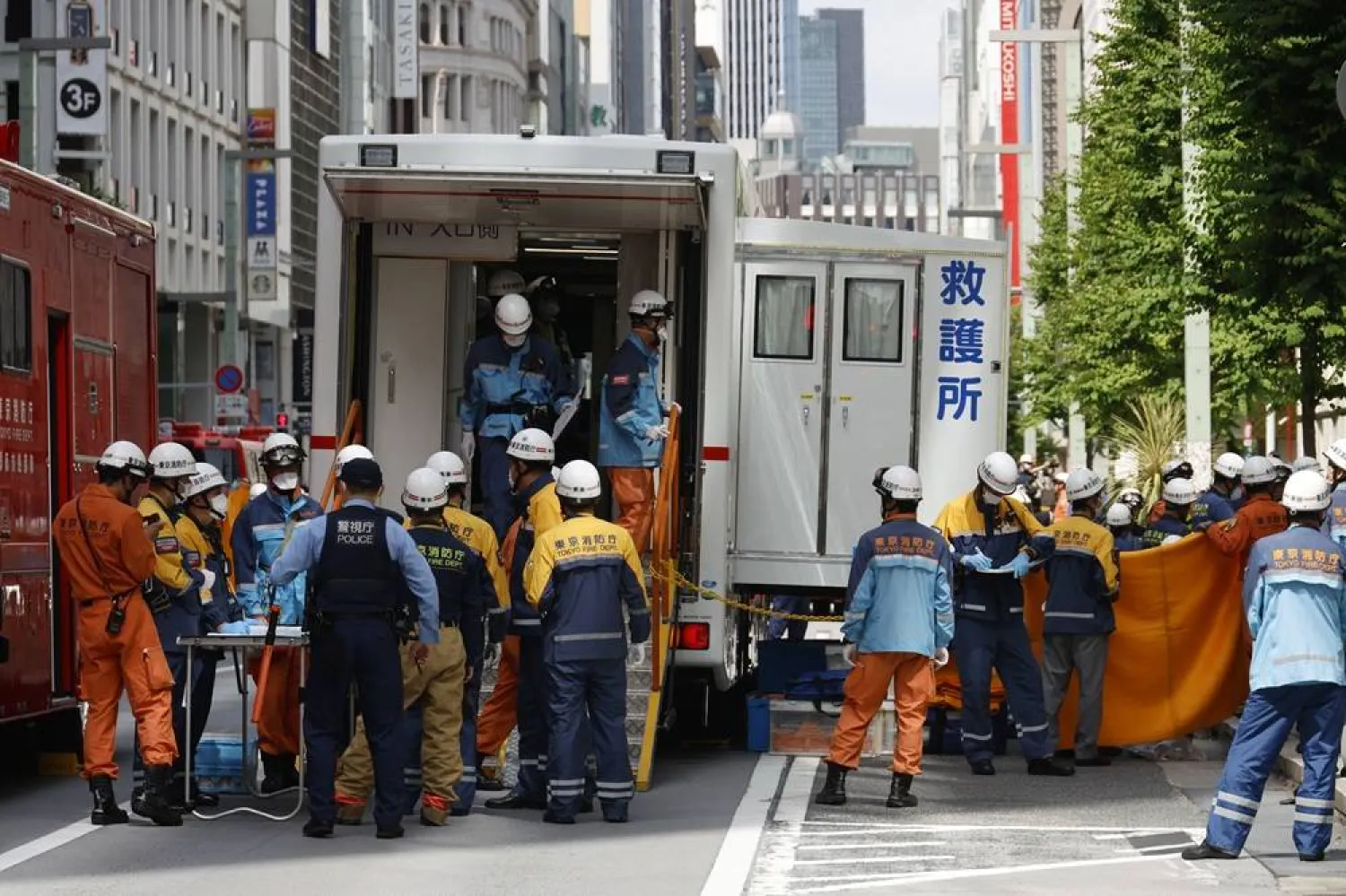 Tear gas-like spray at Tokyo luxury mall injures about 20 people