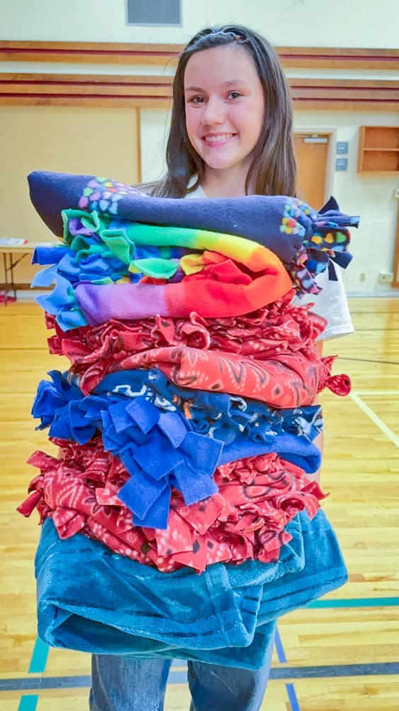 Teen Organizer Crafts Blankets and Scratchers for Local Shelter