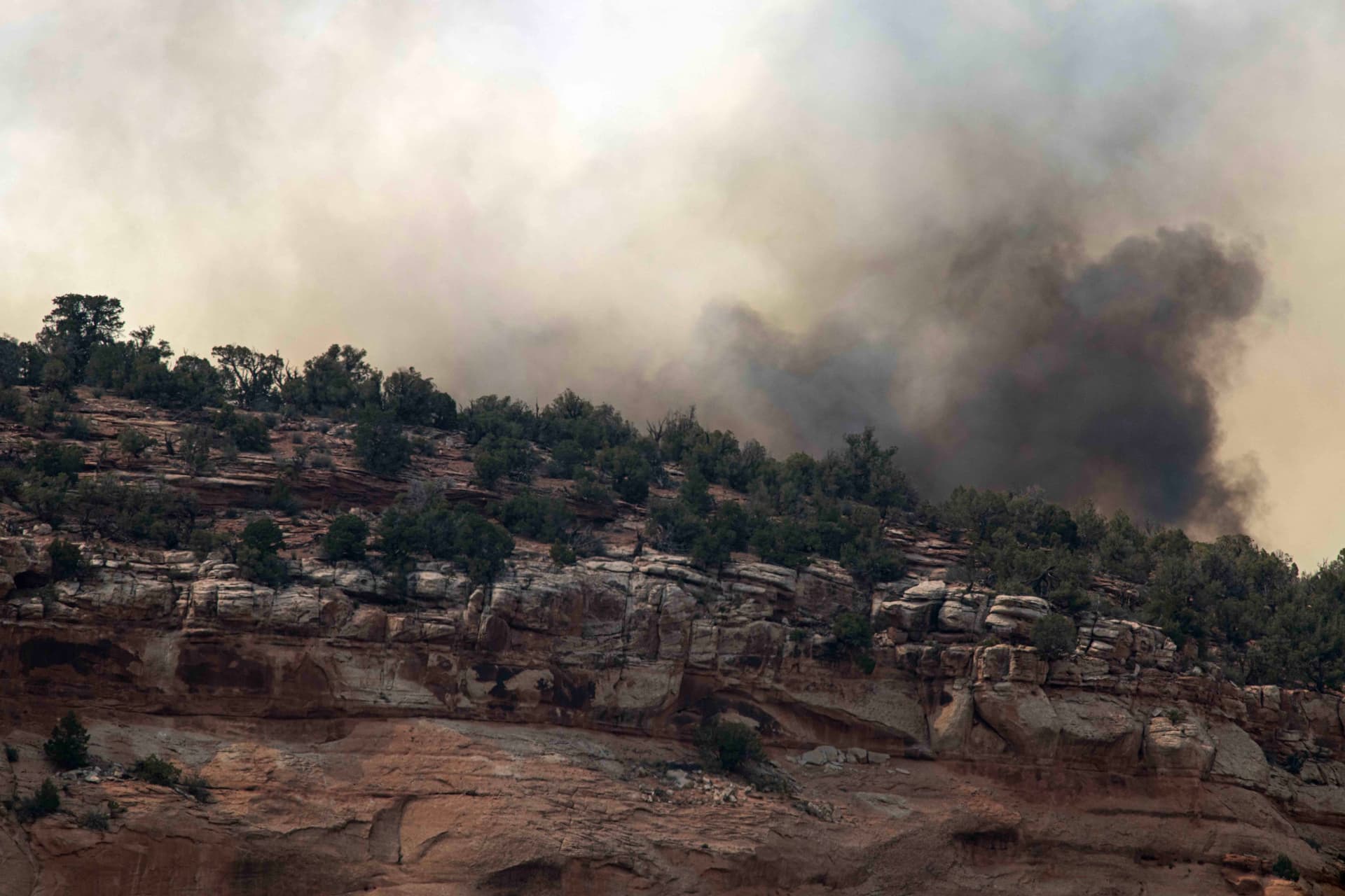 Three firefighters killed as wildfires, flooding and quakes devastate Americas