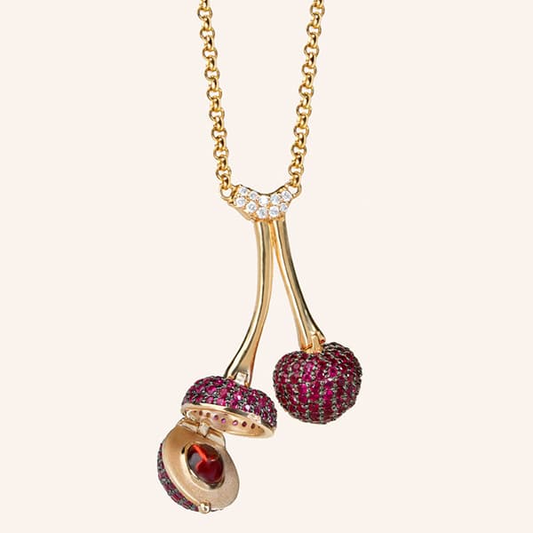 Charm jewelry helps designers tell stories as gold prices soar