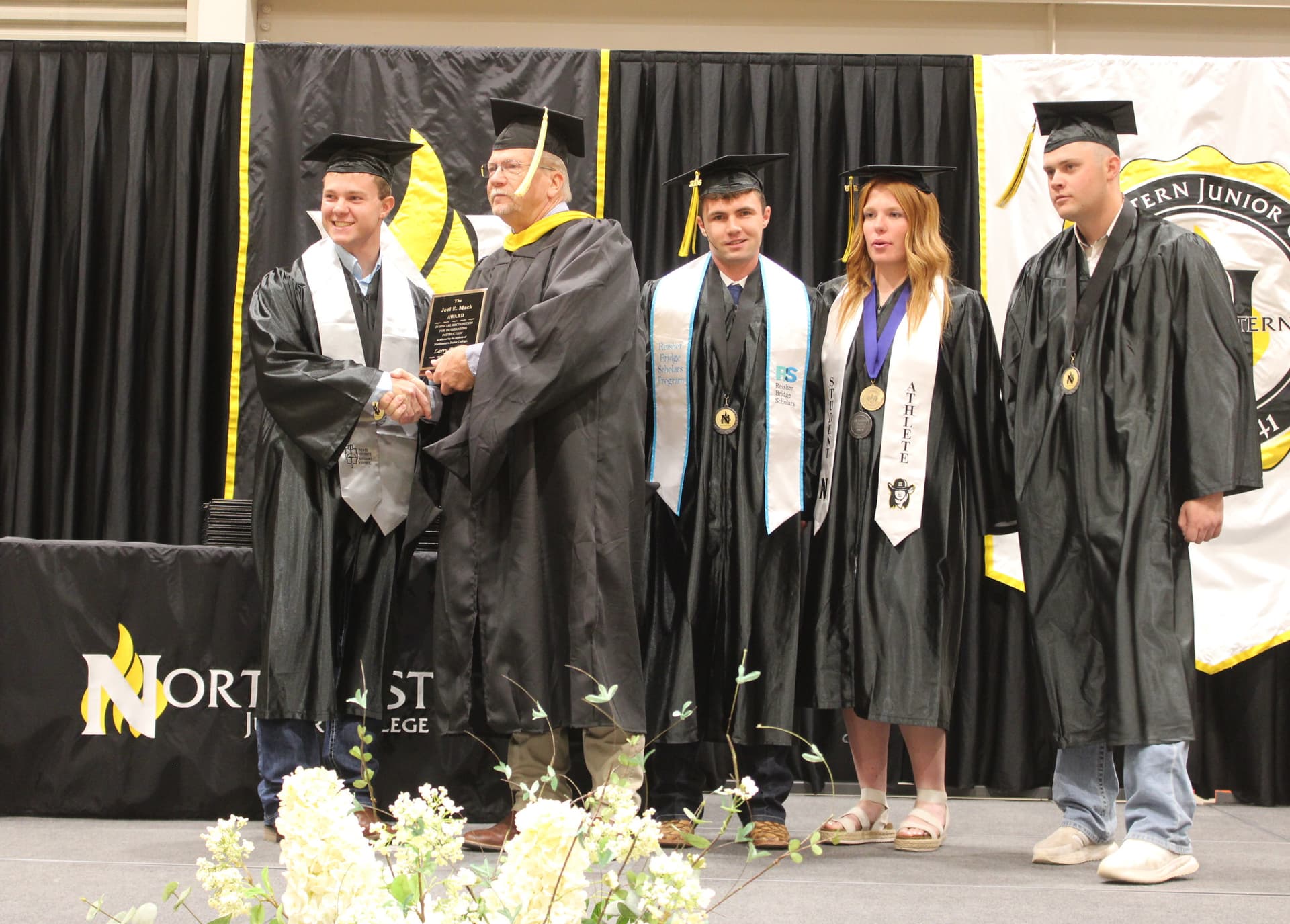 NJC graduates honor three faculty members at commencement ceremony