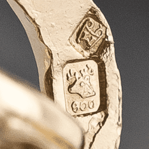 How Hallmarks and Maker's Marks Help Identify Antique Jewelry