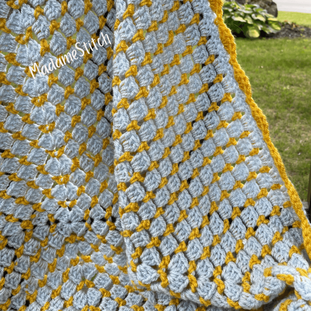 Blissful Block Stitch Baby Blanket Offers Light, Airy Gift Appeal