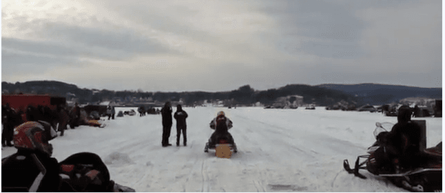 Snowmobile Races on 600-Foot Track Draw Dozens to Newport Ice