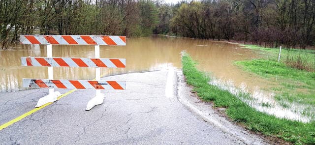 Heavy rains flood Adams County lake, spillway overflows in West Union