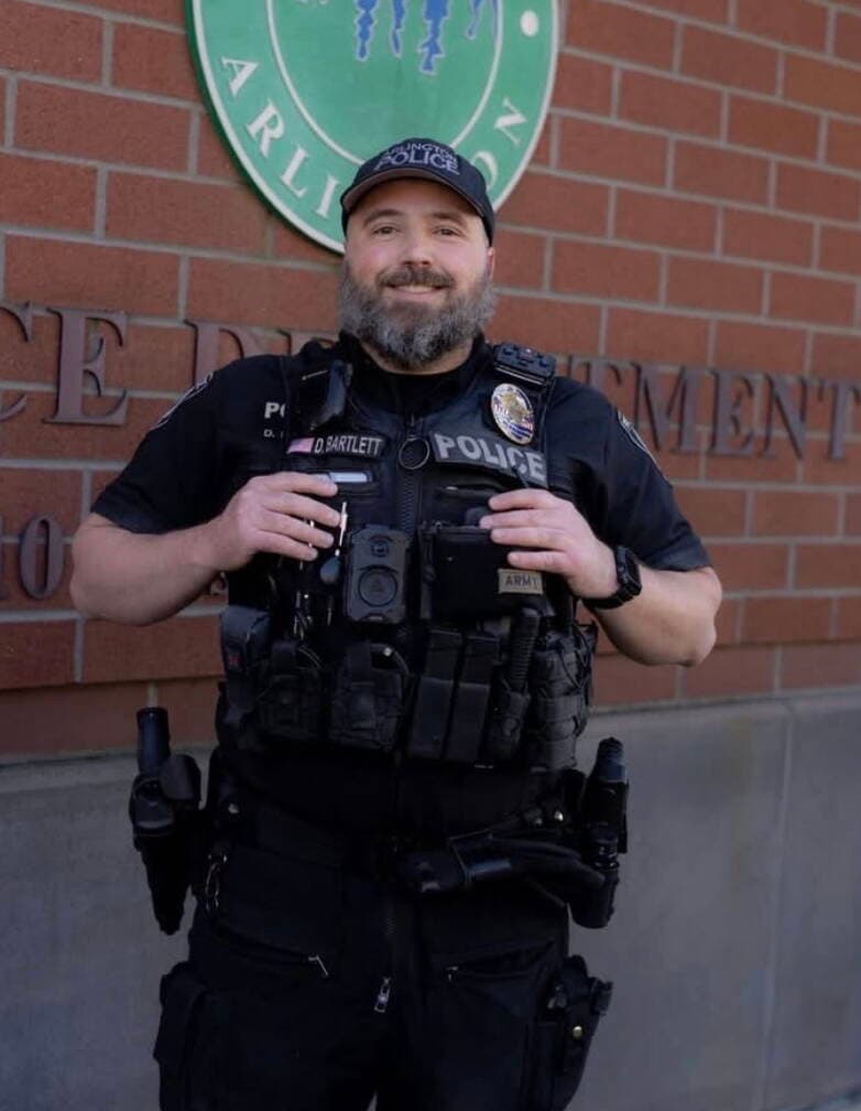 Bail revoked for Arlington officer accused in Camano Island child porn case