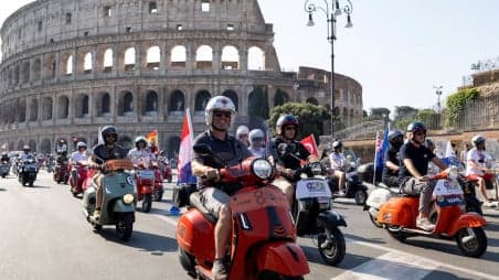 Thousands of Vespas flood Rome to mark 80 years of the scooter