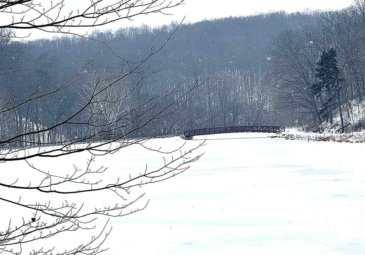 Lake Alma Covered in Ice and Snow as Winter Advisory Issued