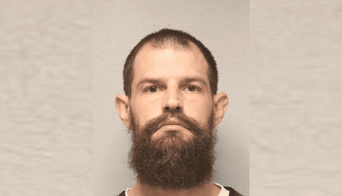 Duluth man charged after police find cocaine, guns, vest in home search