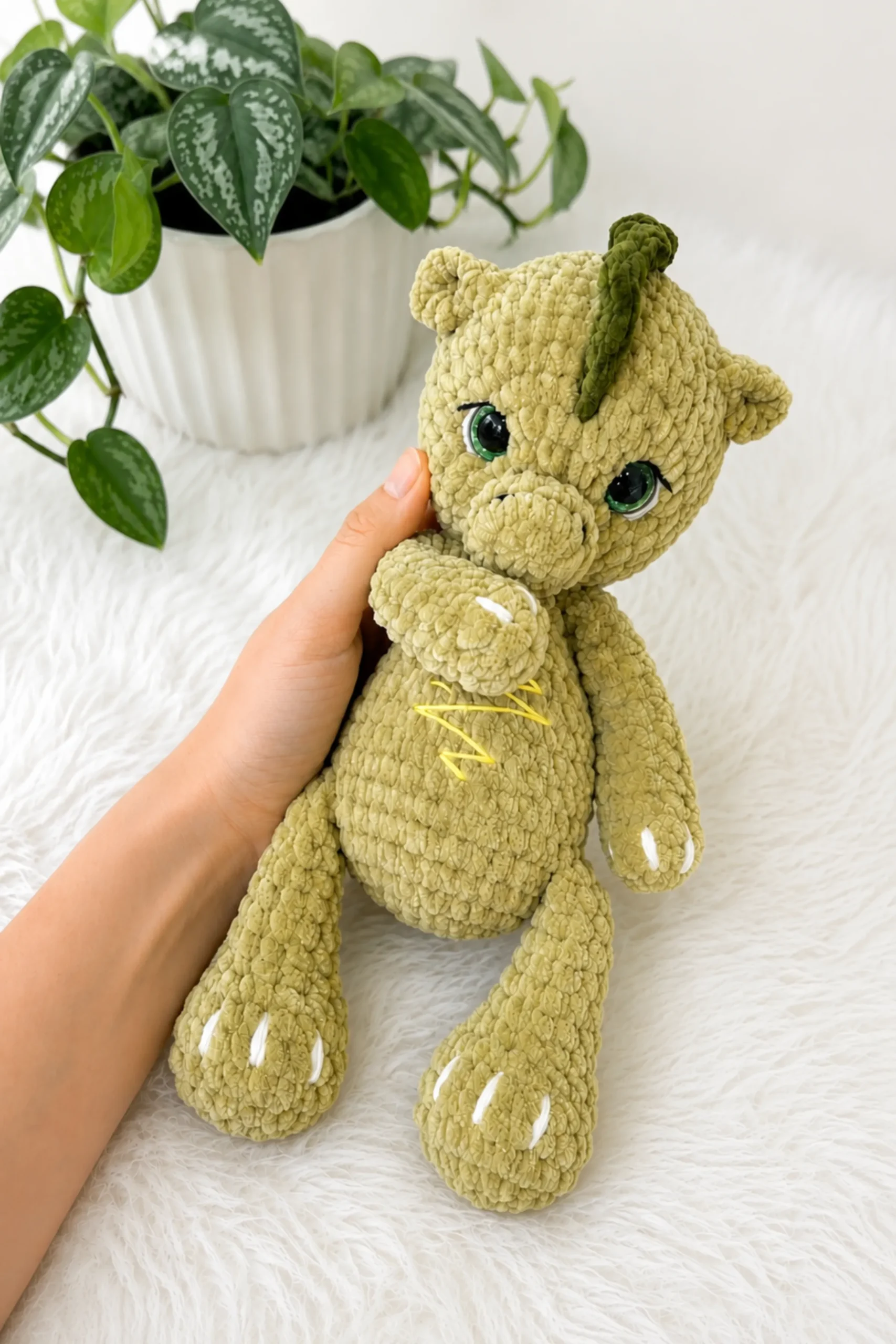 Free Dino Lilaf amigurumi pattern makes a playful baby dinosaur plush