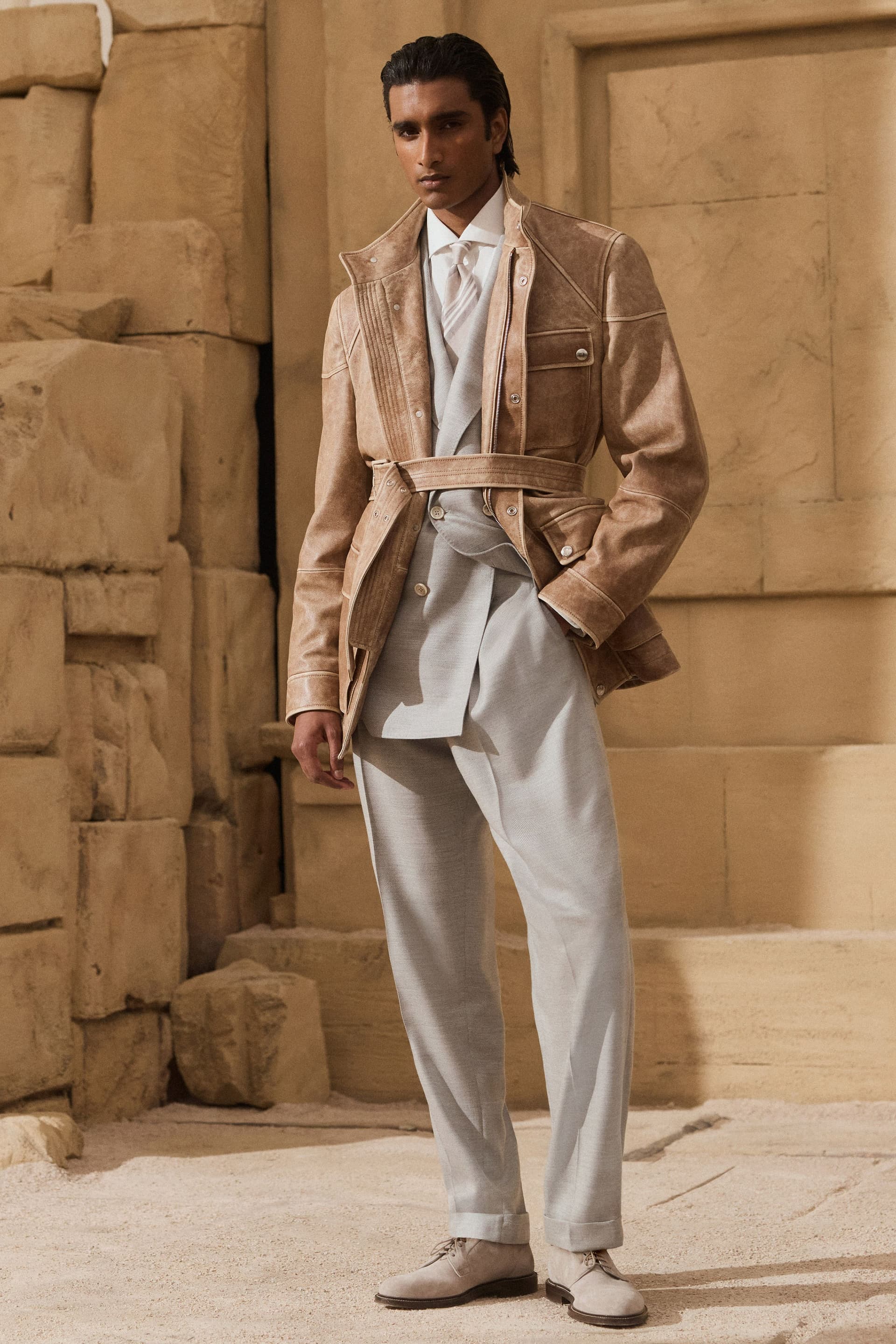 Brunello Cucinelli softens old money tailoring with relaxed safari layers