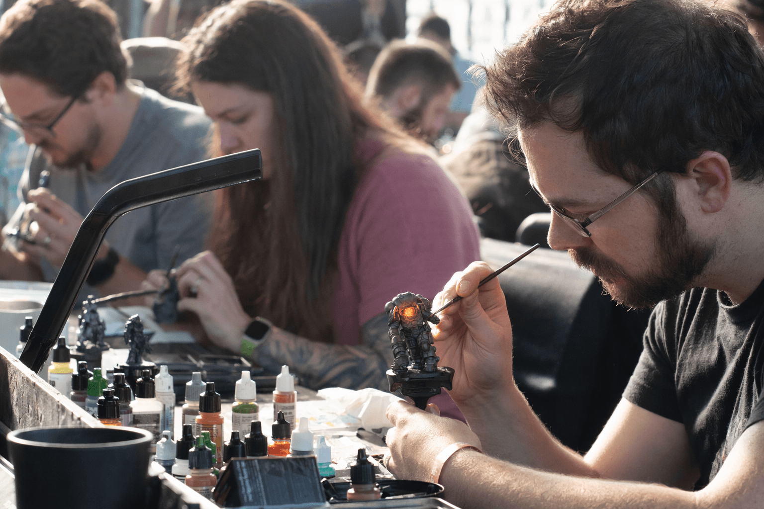 Miniature painter's helmet glow shows striking object source lighting effect