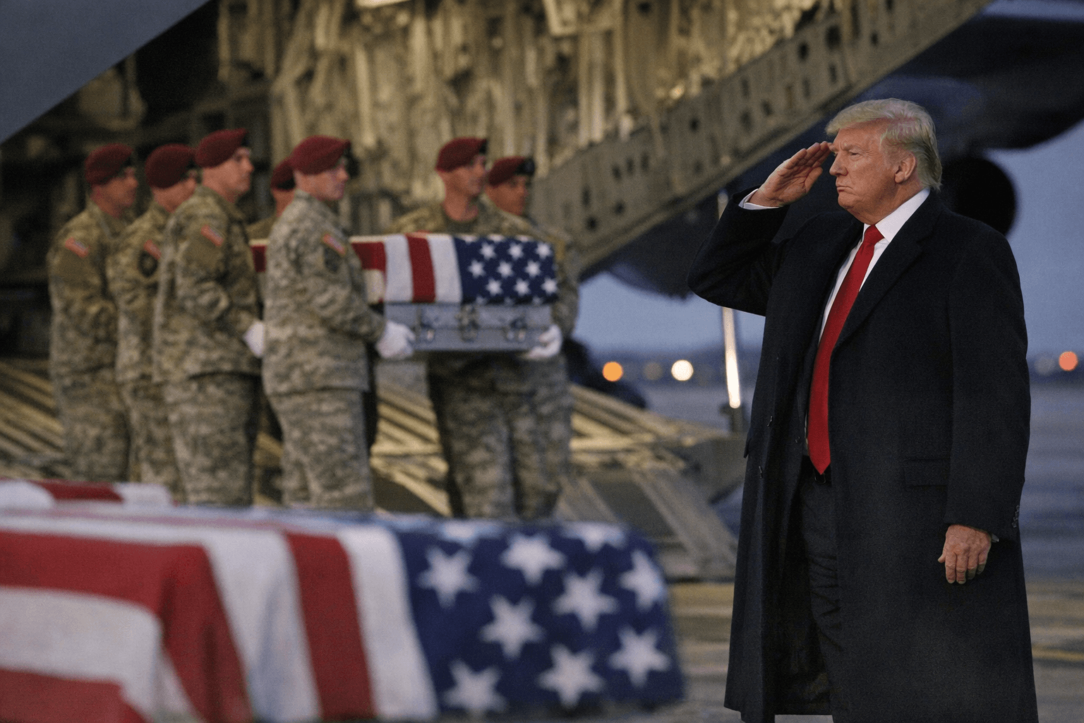 Trump salutes as six service members killed in Kuwait are returned to U.S.