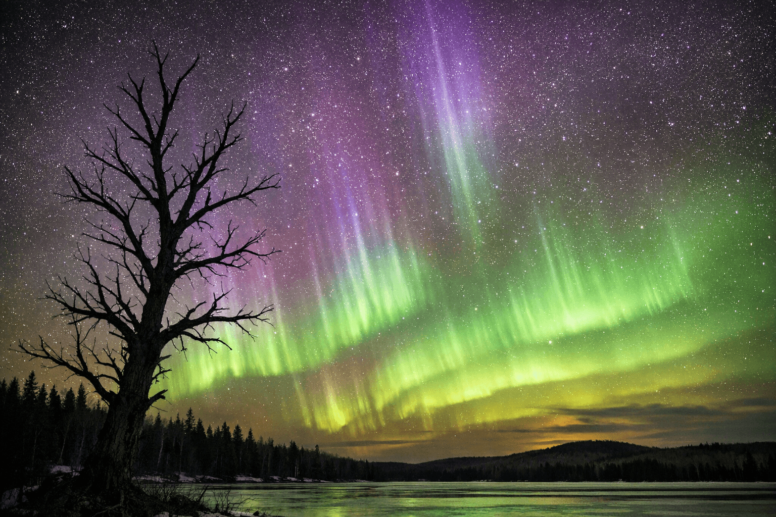 Kevin Zini Captures Stunning Aurora Borealis Display Over Iron County