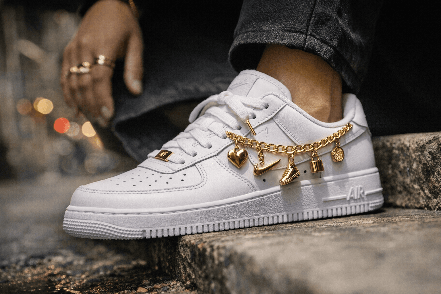 Nike Dresses the Air Force 1 Low in Gold Charm Details