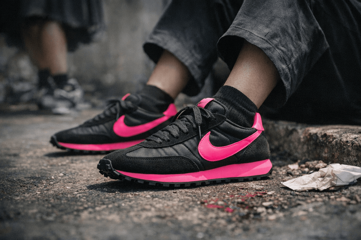 BLACK COMME des GARÇONS reimagines Nike LD-1000 in black and pink
