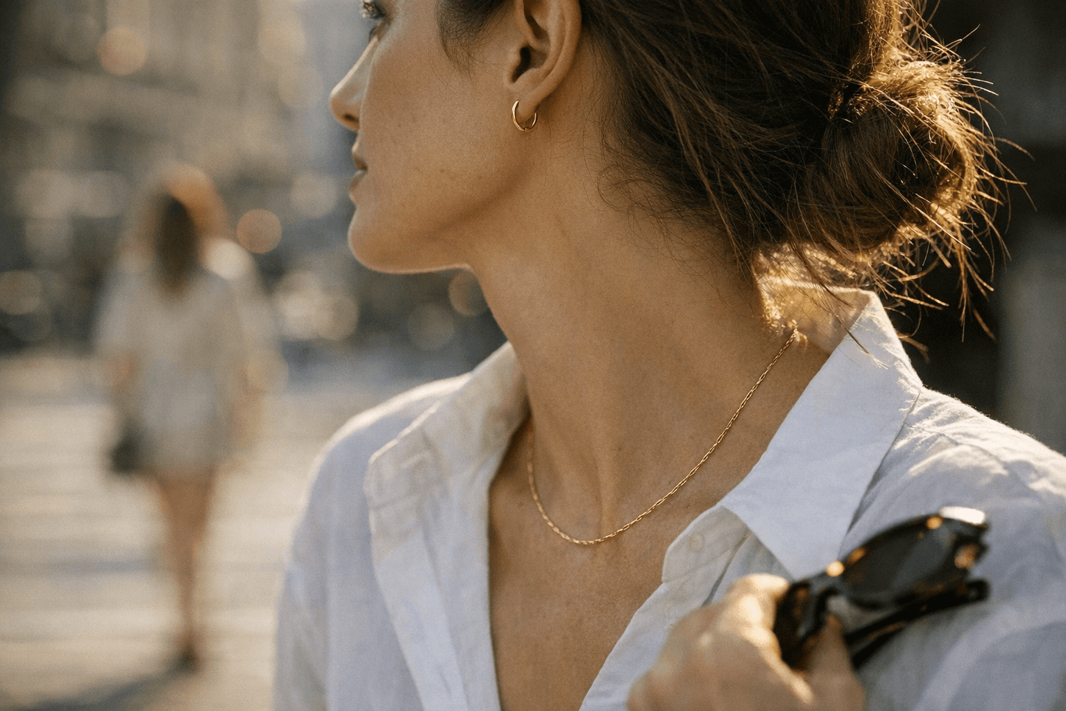 Minimalist gold jewelry emerges as spring's most useful style anchor