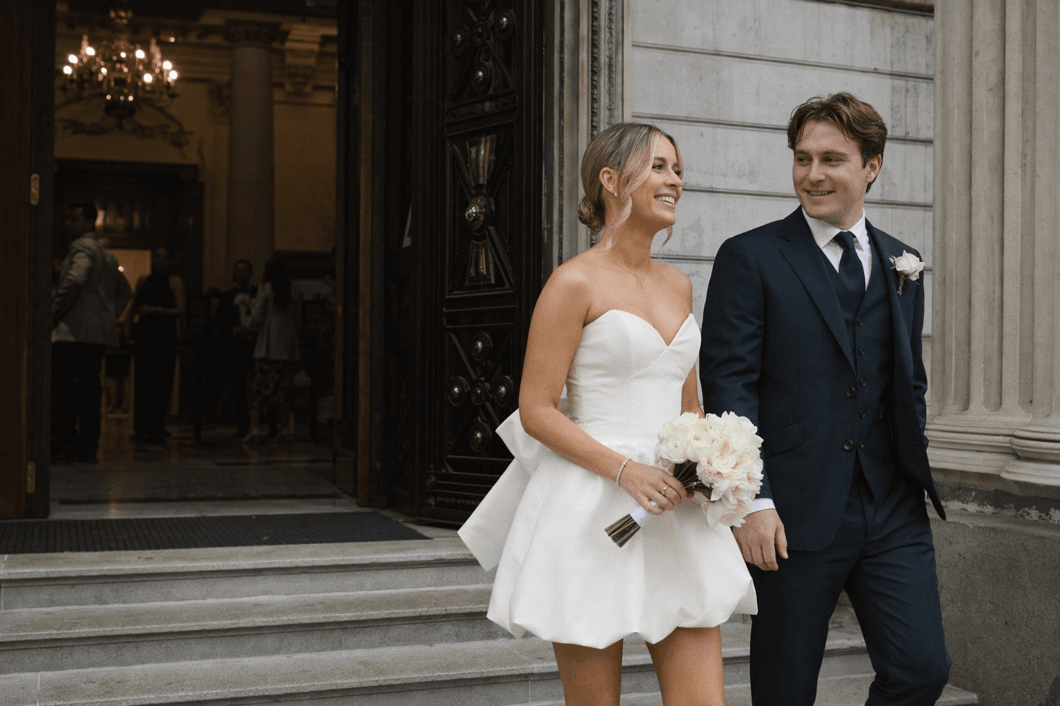 Laura Fox champions the bridal mini trend in a playful puff-ball dress