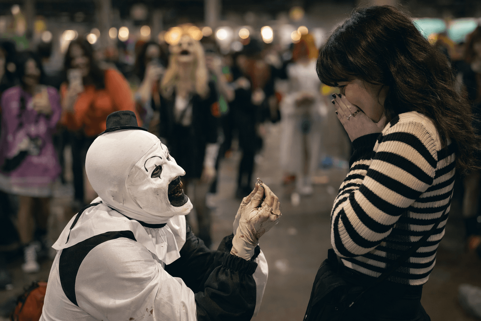 Art the Clown actor proposes with heirloom ring at comic expo