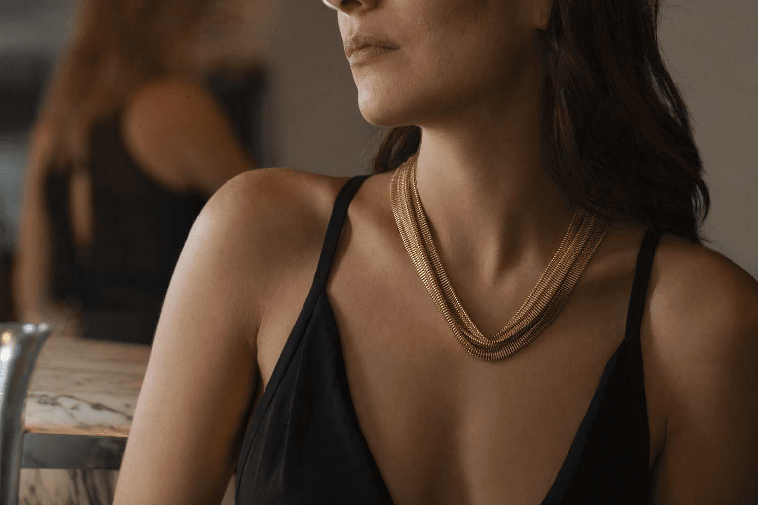 Charles Holl’s Draperie necklace turns gold into fluid fabric