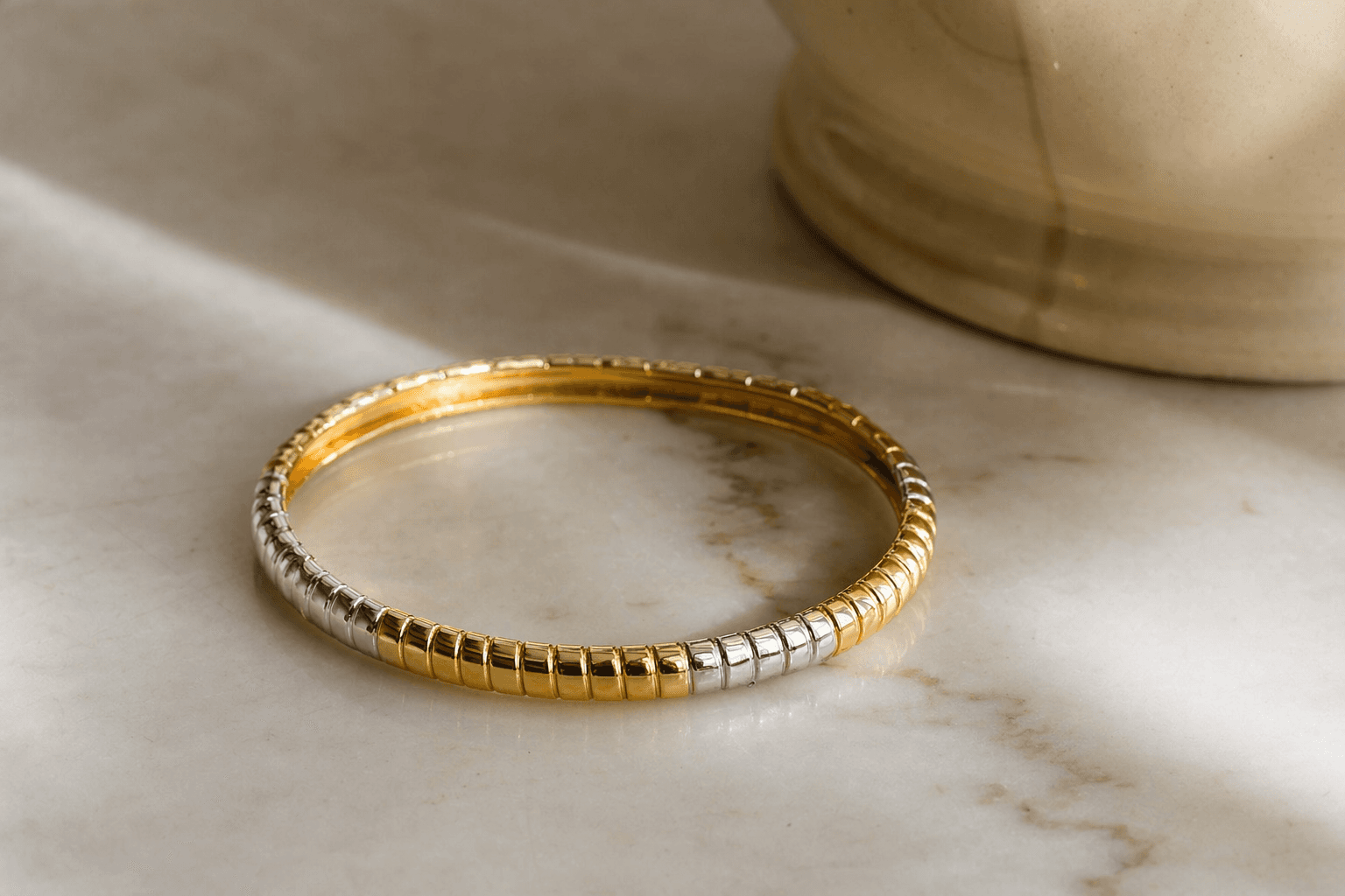 Slim Toscana Italiana bangle delivers polished mixed-metal style for $20