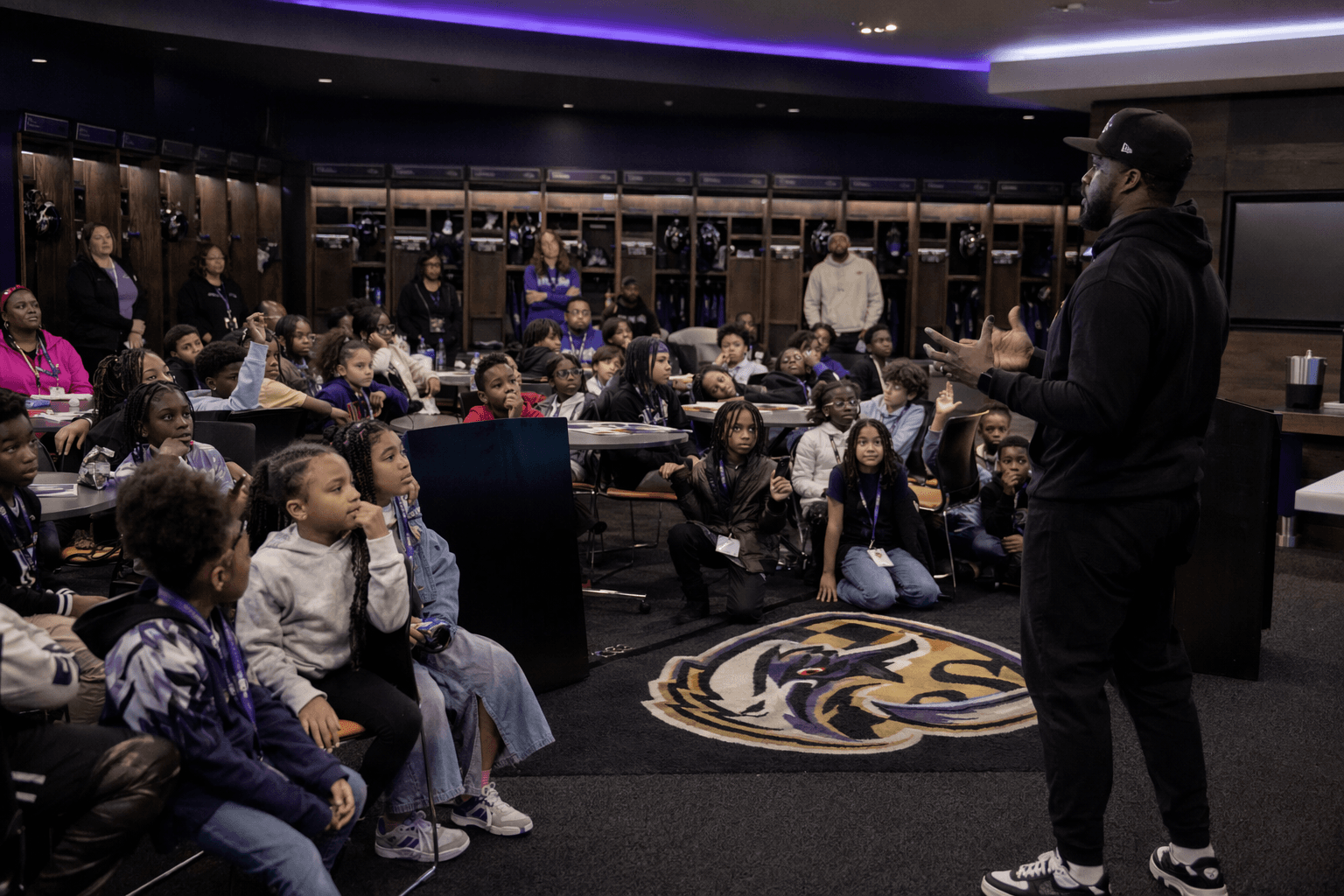 Baltimore elementary students learn budgeting in Ravens locker room
