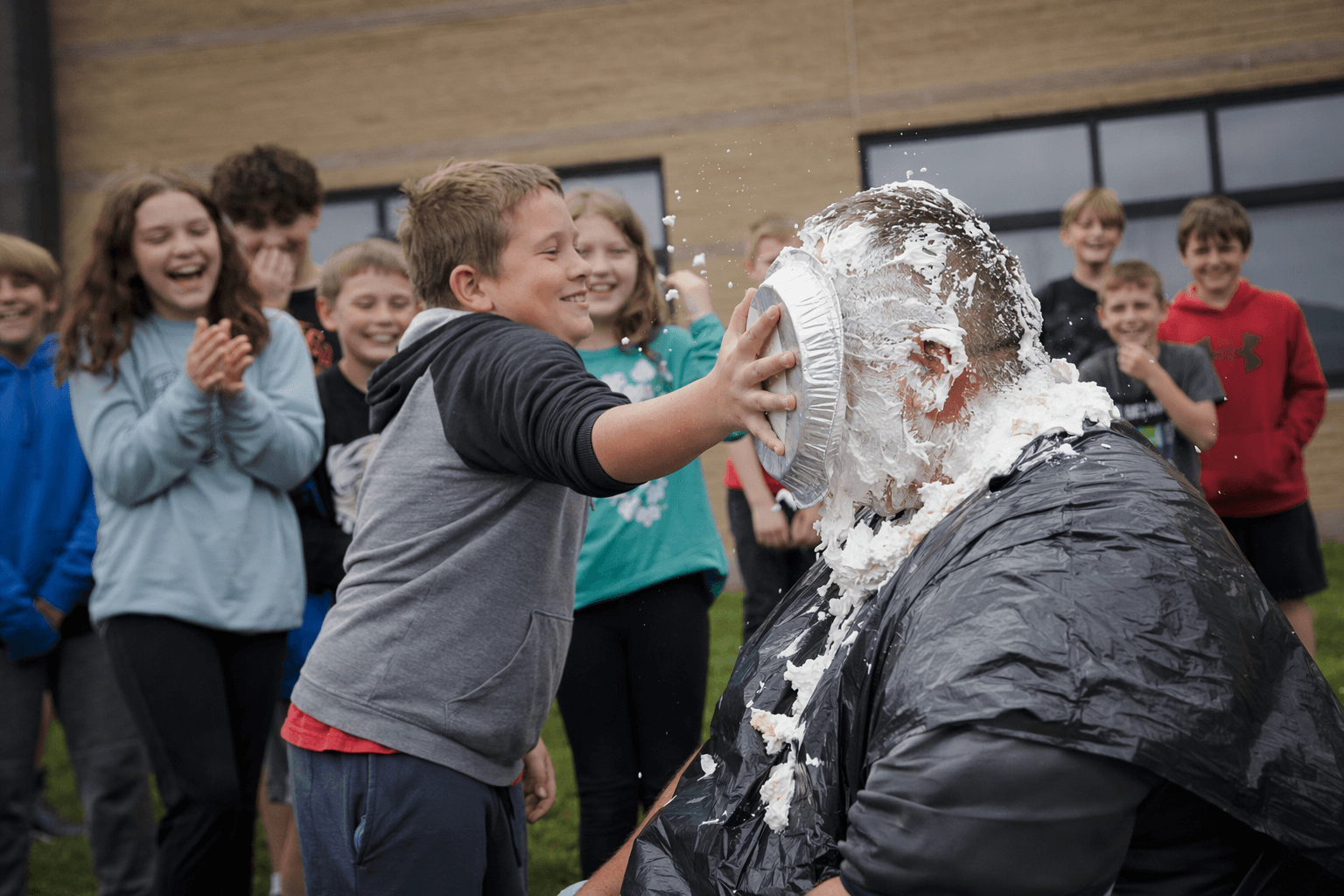 Owsley County Elementary celebrates MAP growth with pie-the-teachers reward