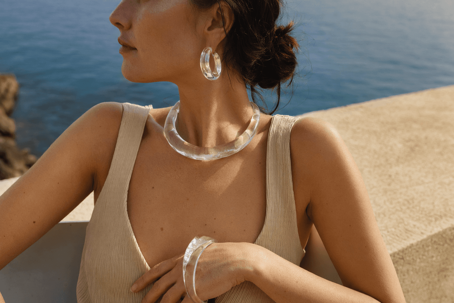 Clear Lucite Jewelry Brings Quiet Luxury to Summer Wardrobes