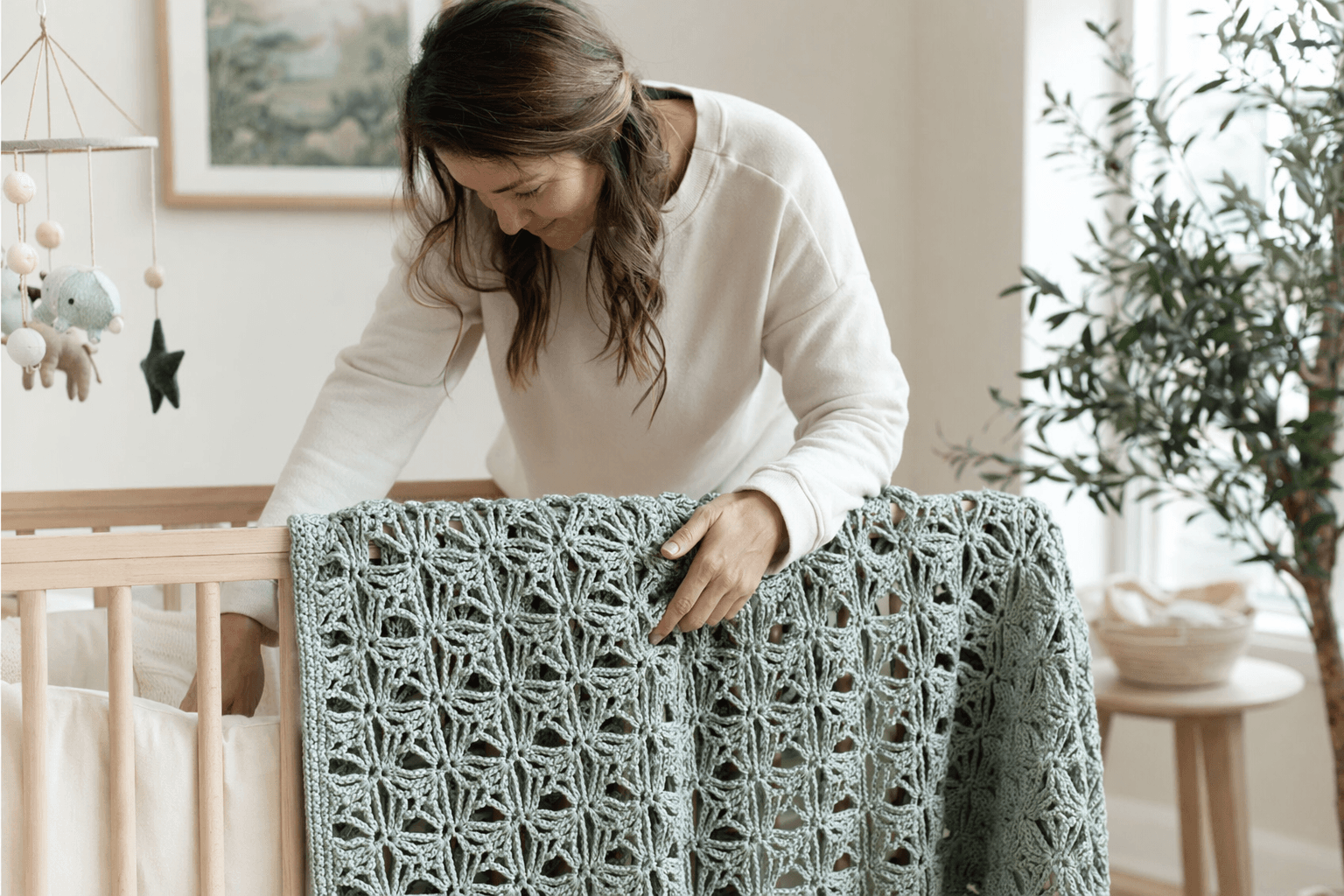 Dana Nield Designs releases airy lotus stitch crochet baby blanket pattern