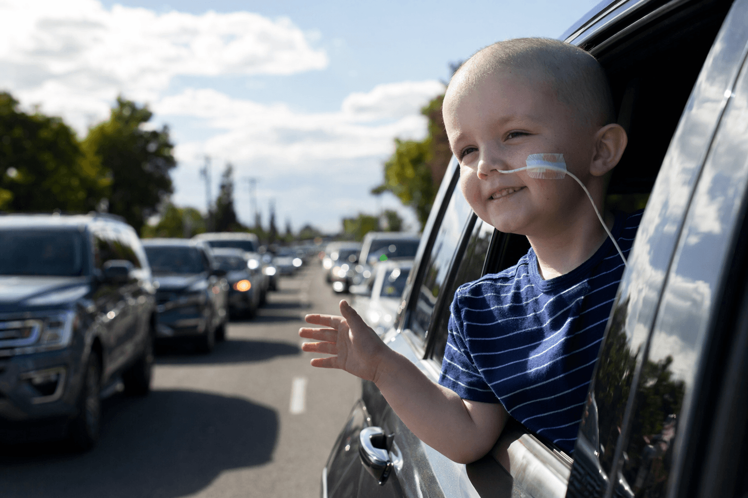 Thousands join Idaho drive-by parade for boy battling leukemia