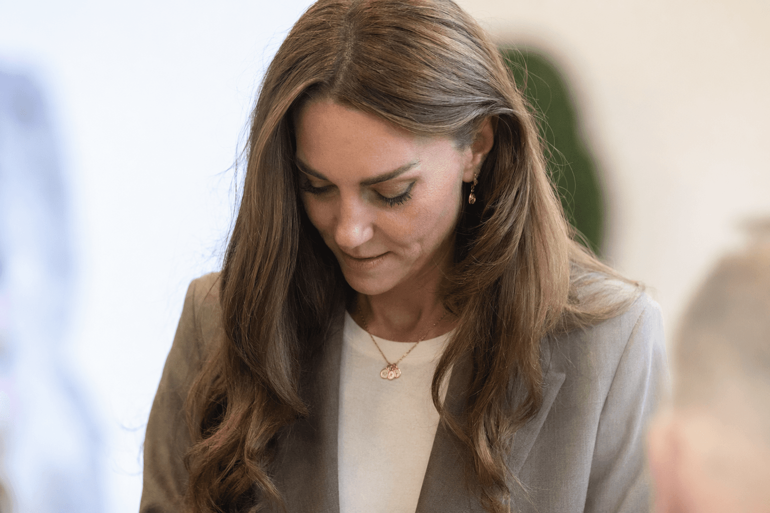 Kate’s customizable Daniella Draper necklace nods to her three children