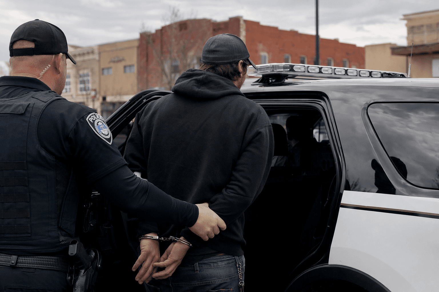 Baker City police cite one man on warrant, jail another on weapon charge