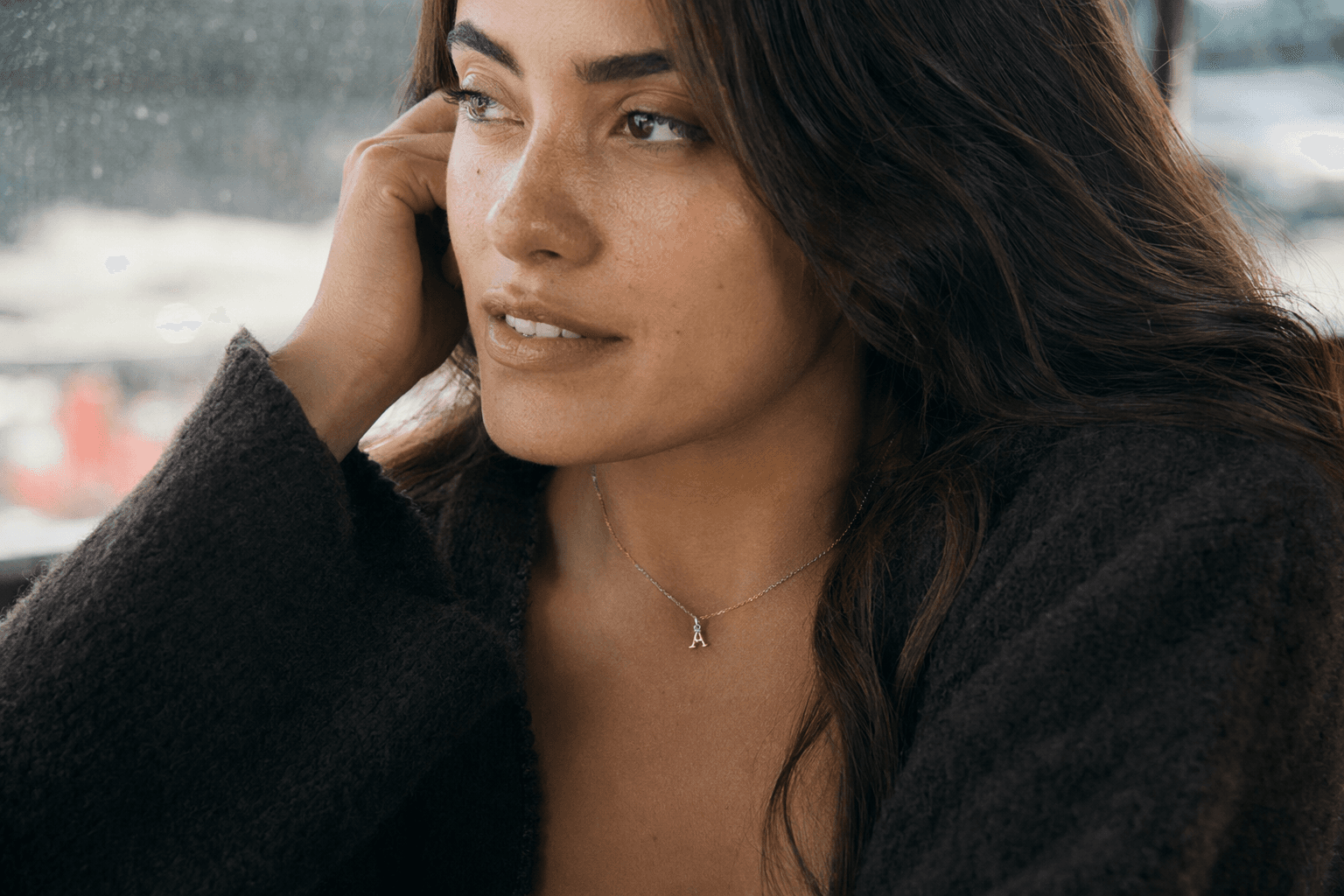 Anthropologie’s mixed-metal monogram necklace is a dainty everyday layering piece on sale