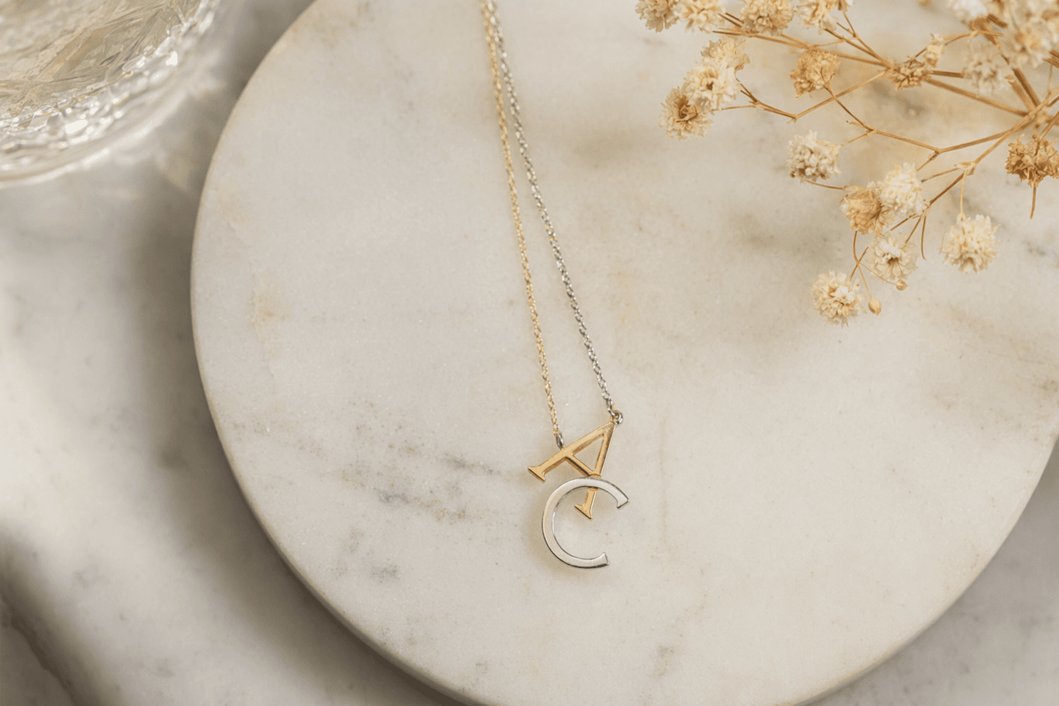 Anthropologie’s Mixed-Metal Monogram Necklace offers a personalized gift at $33.60