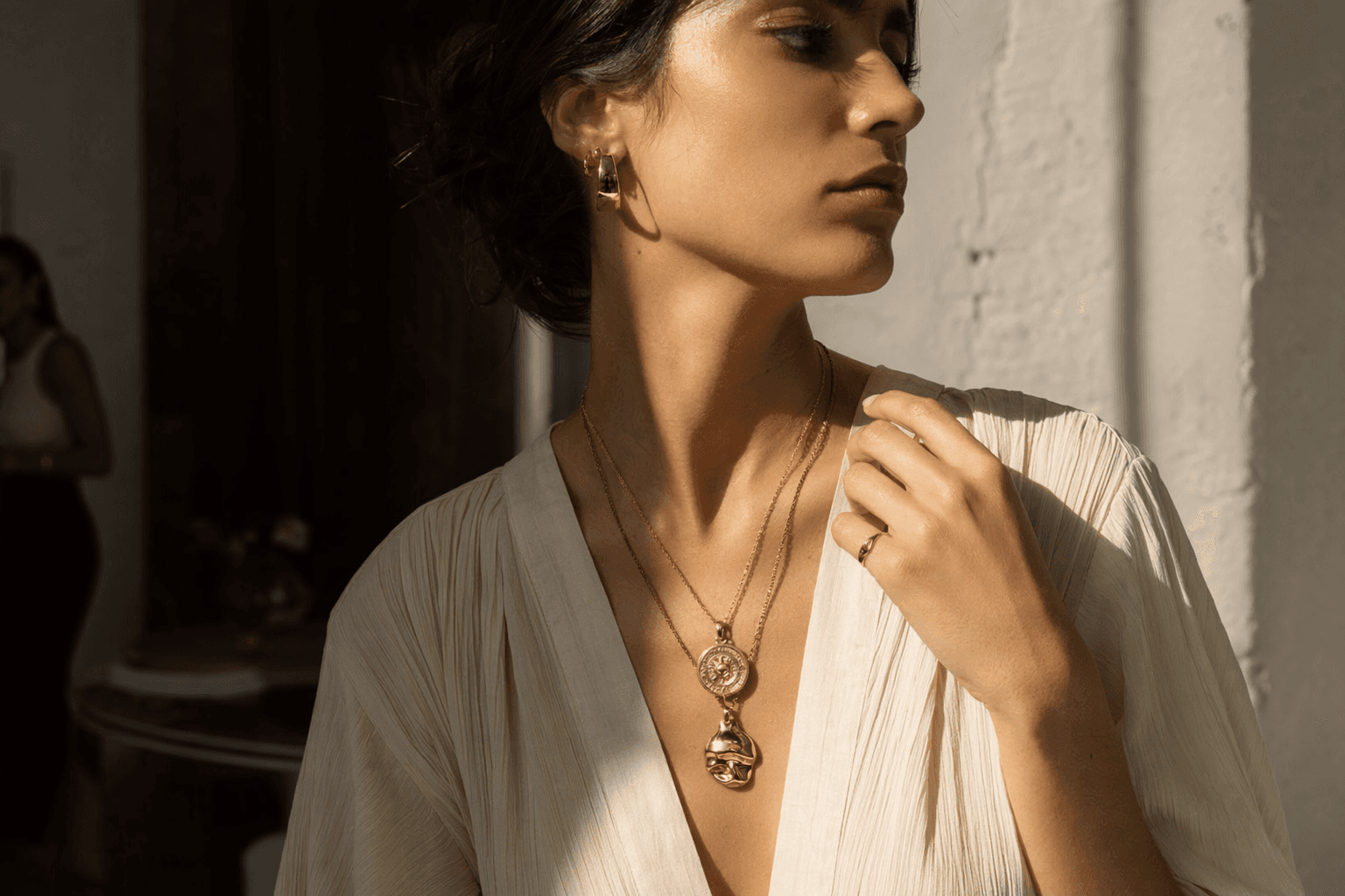 Amulet necklaces replace delicate chains in Spring 2026 jewelry trends