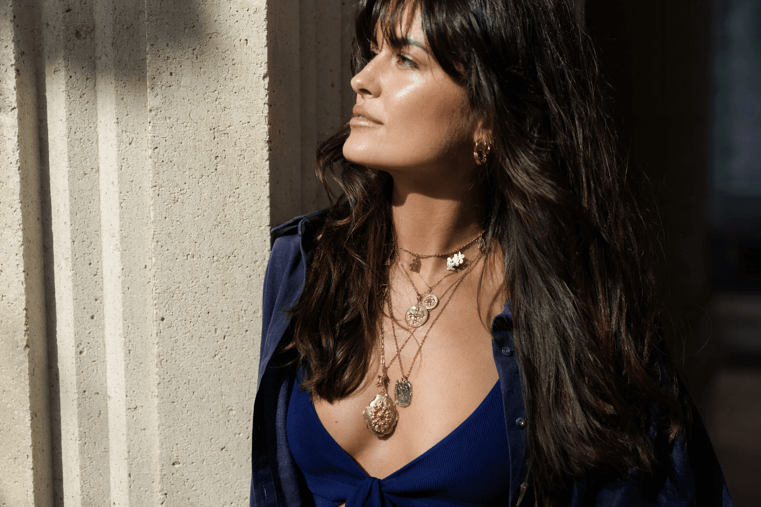 Spring 2026 Jewelry Layering Turns Bold With Amulets and Pendants