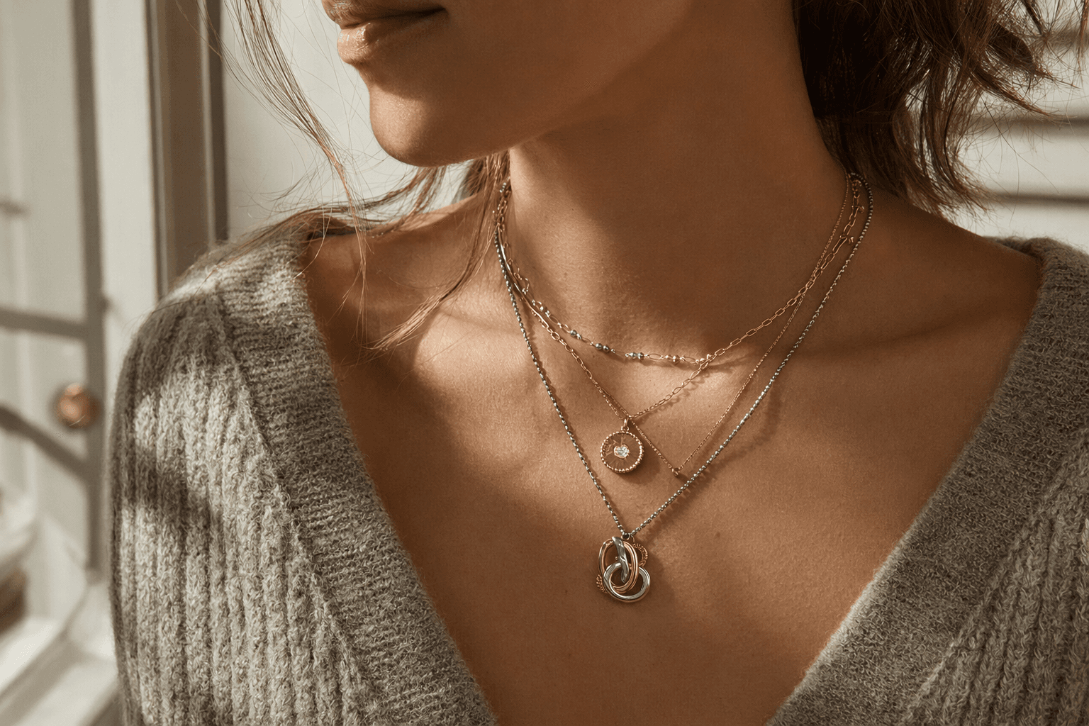 Anthropologie’s Mixed-Metal Monogram Necklace Makes Layering Easy for Everyday Wear