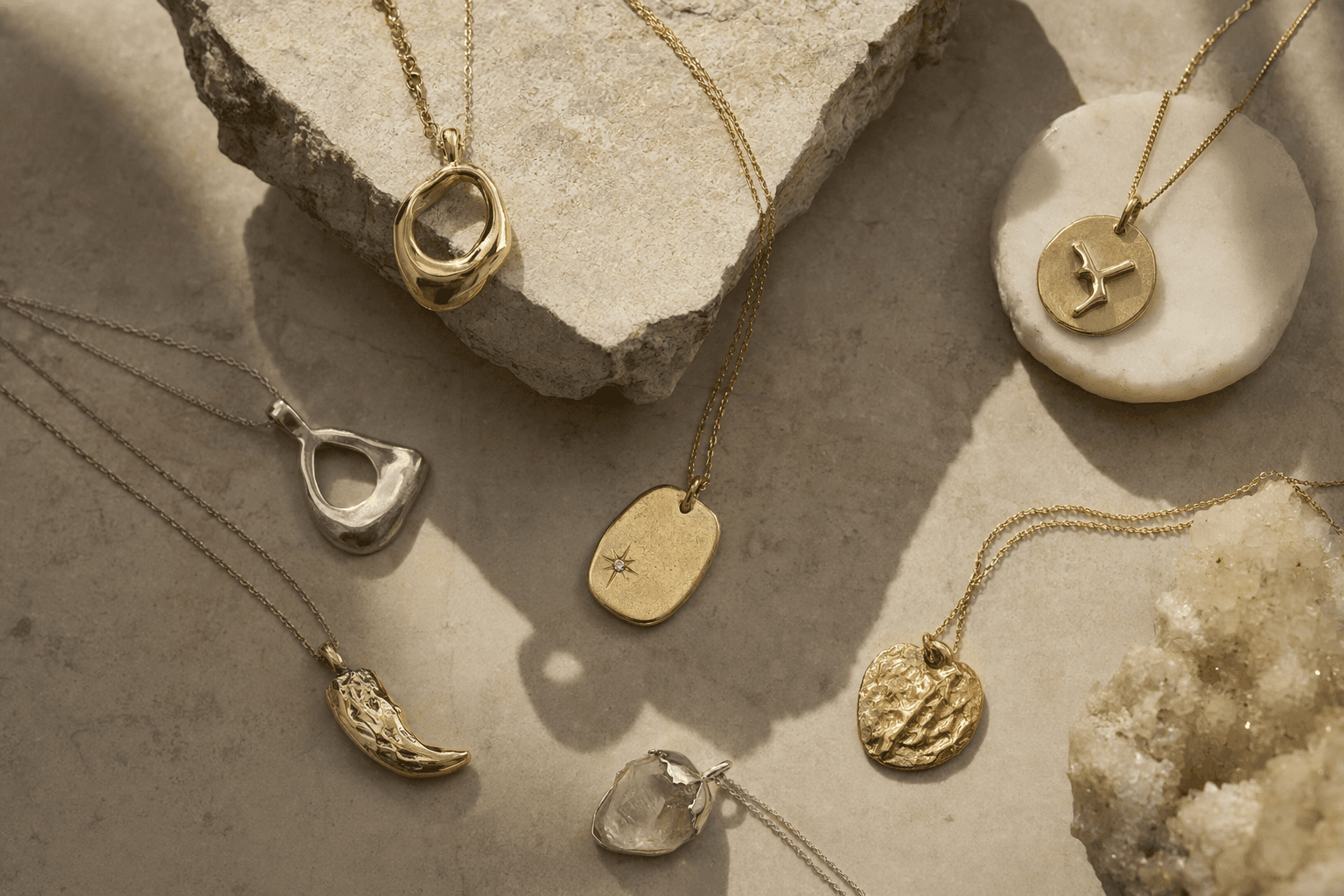 Minimalist Jewelry Evolves Into Sculptural Pendants and Amulet Necklaces