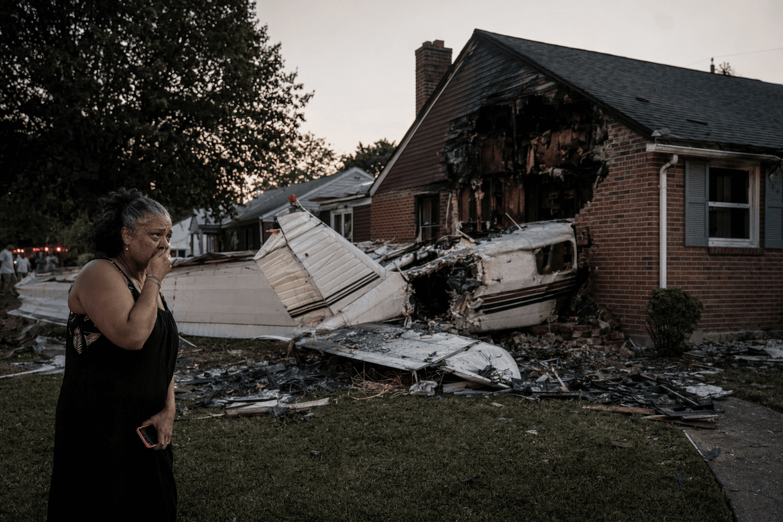 Plane crashes into Akron home, killing two aboard, family escapes