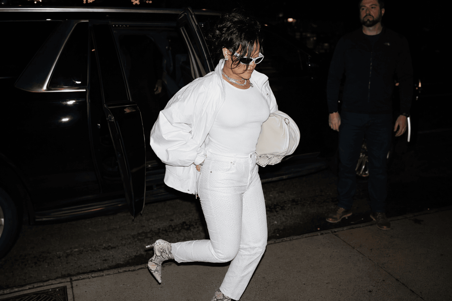 Rihanna’s monochrome white jeans formula gets a snakeskin finish