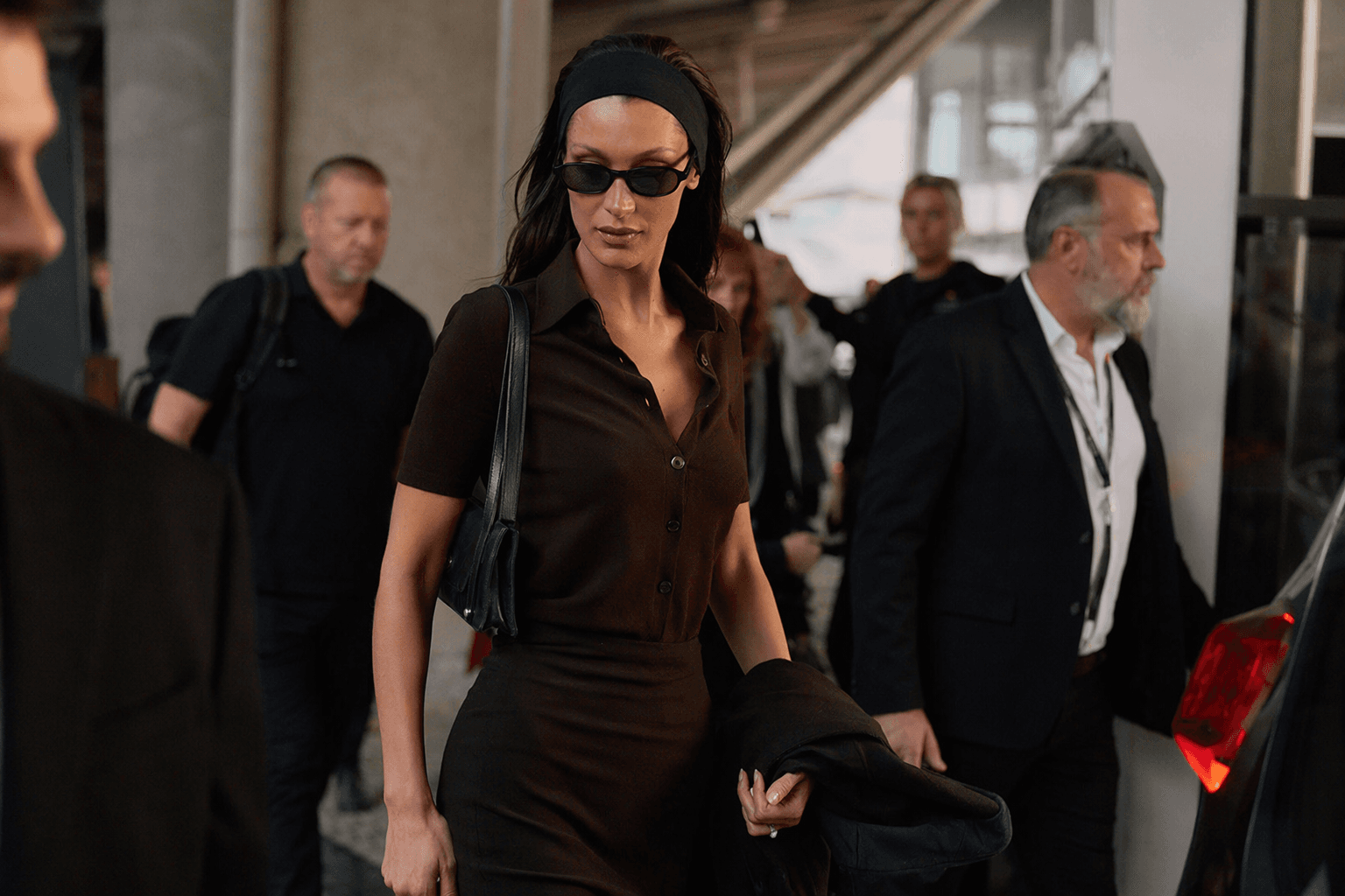Bella Hadid channels vintage Prada jet-set style at Cannes arrival